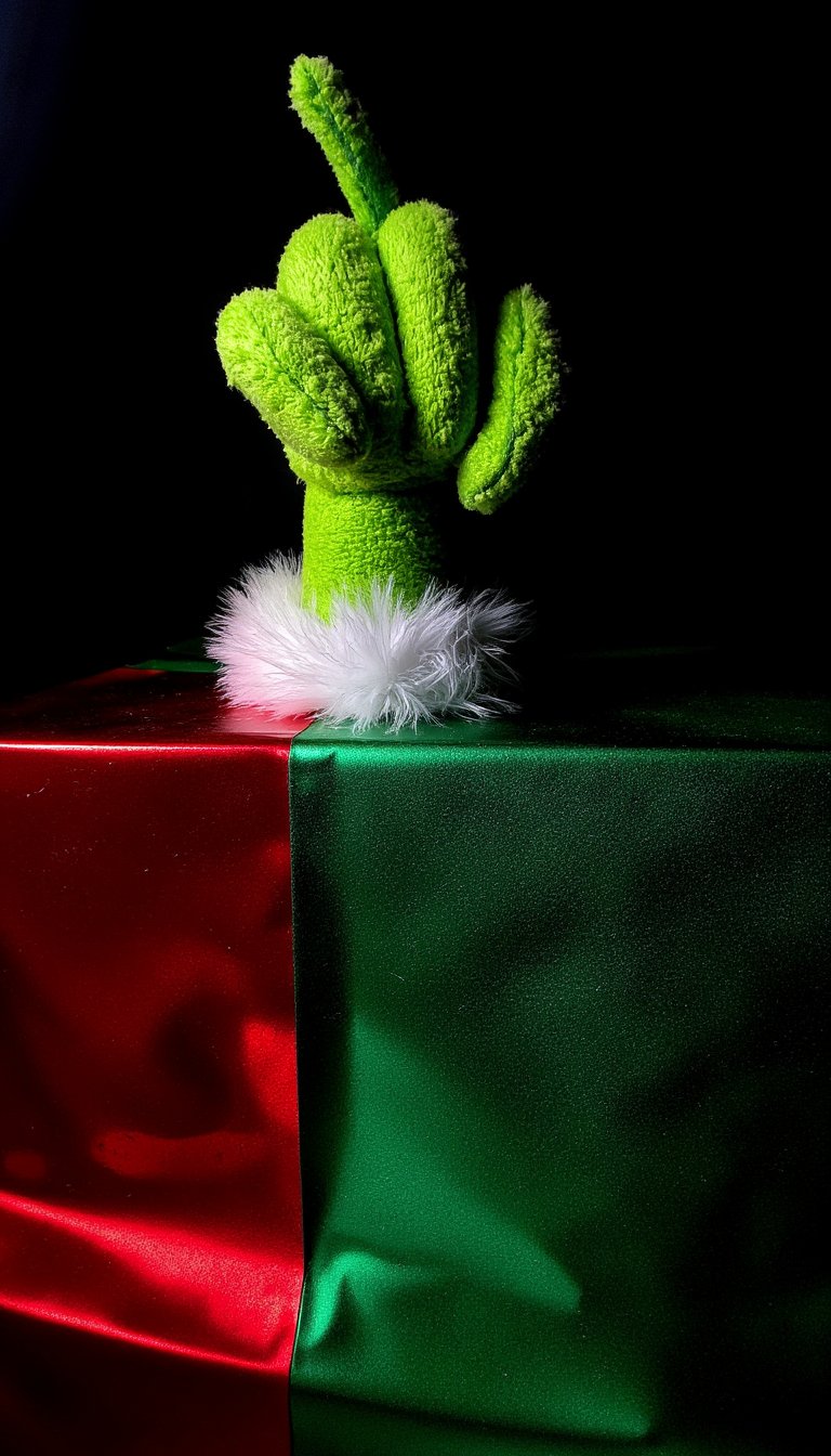 4. "You're a Mean One" Grinch Hand Gift Topper