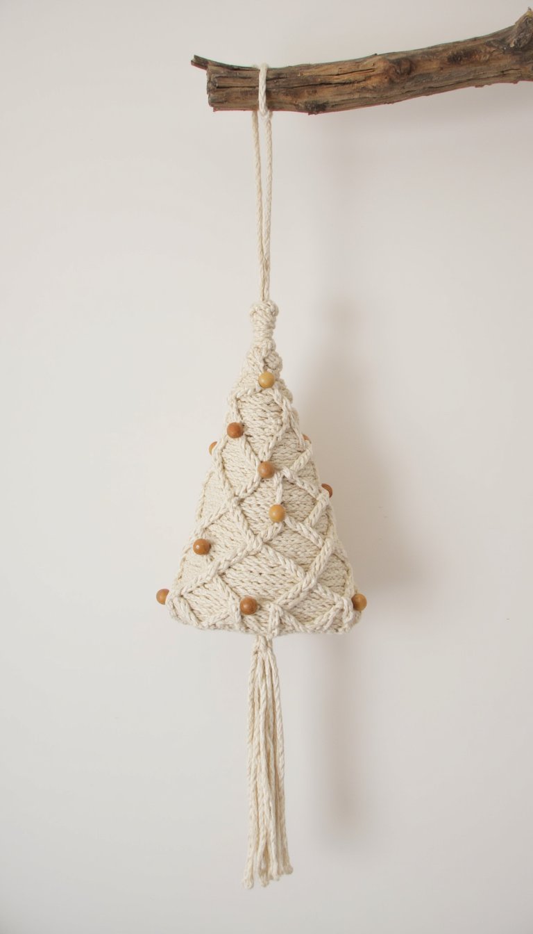 23. Macrame Christmas Tree Wall Hangings
