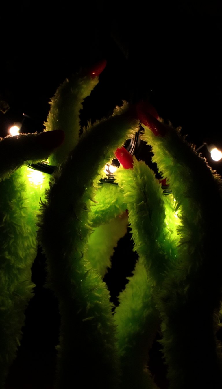 15. Grinch Hand String Lights