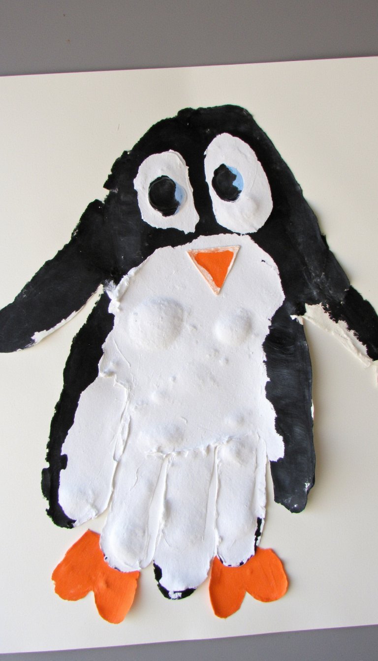 9. Snuggly Handprint Penguin