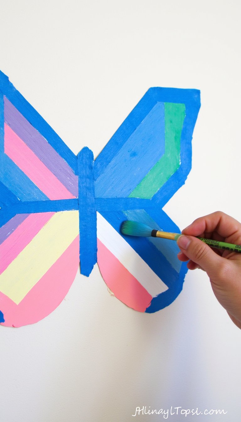 13. Butterfly Wing Wall Decals with Painters Tape