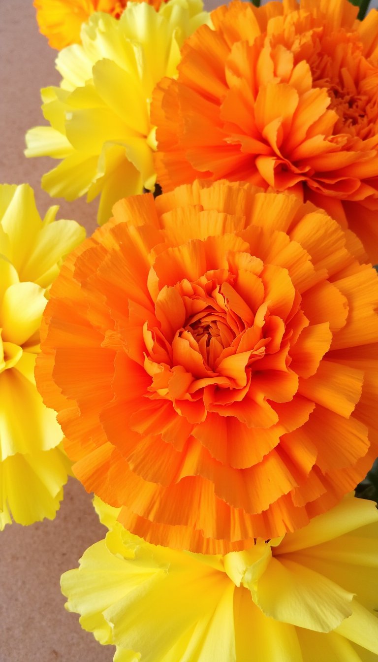 12. Playful Paper Marigolds for Dia de los Muertos