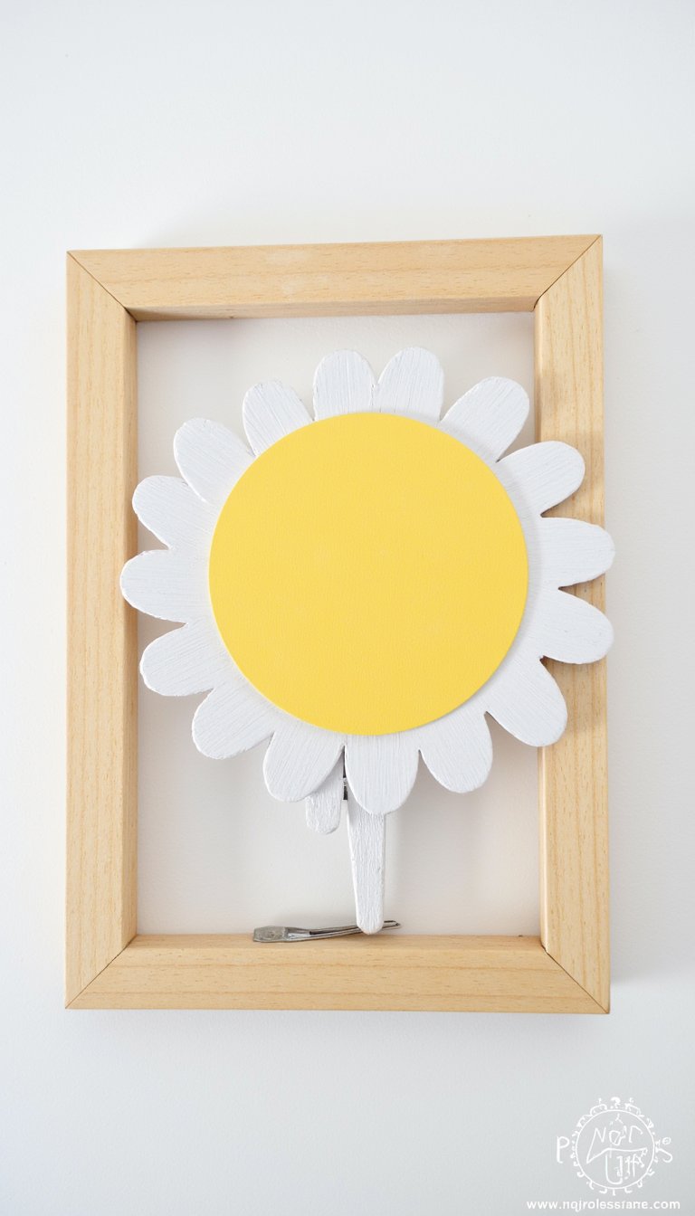 14. Clothespin Daisy Frame