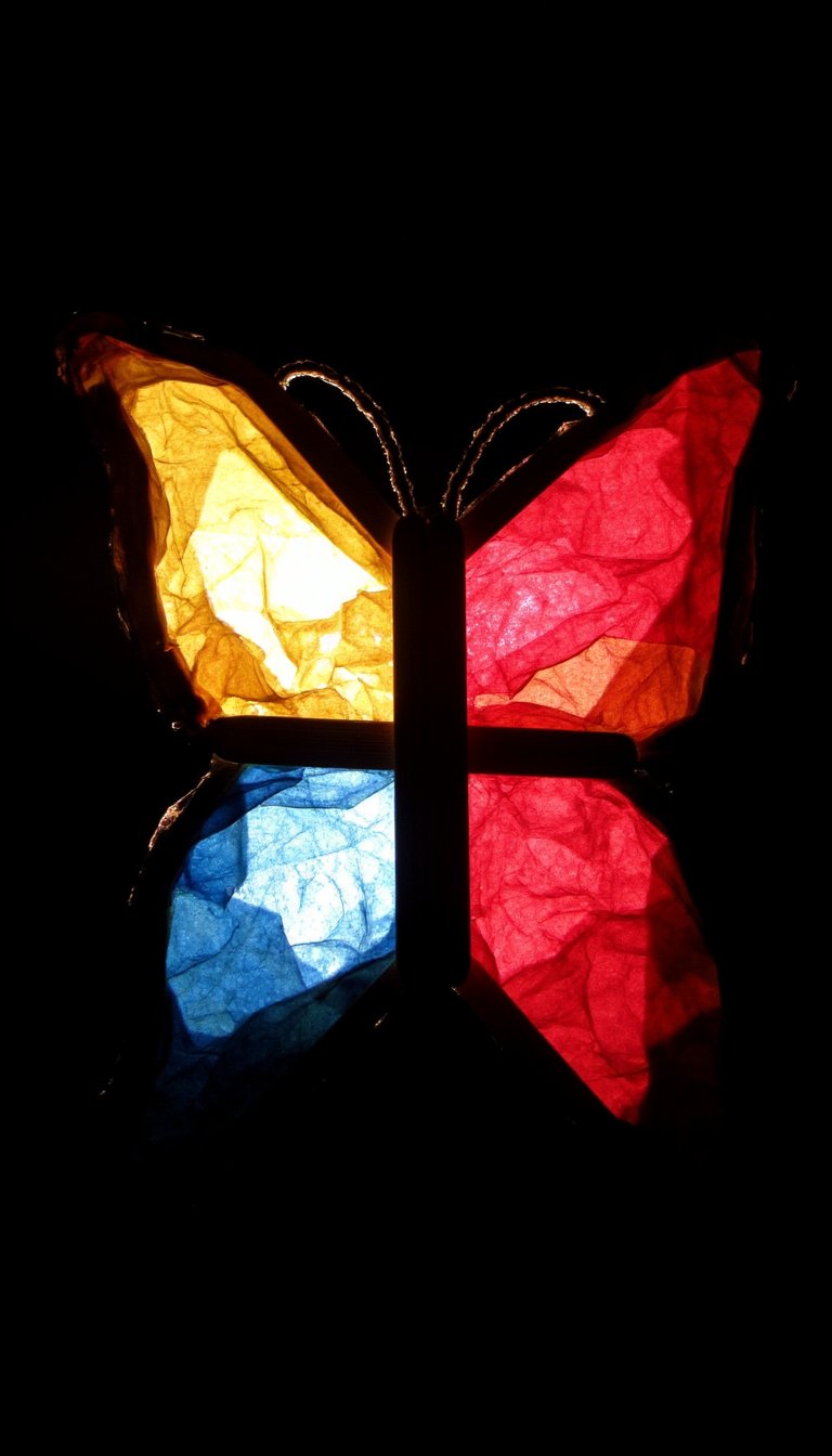 5. Popsicle Stick & Tissue Paper Stained Glass Butterfly