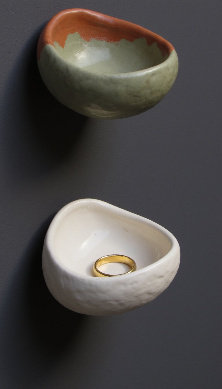 13. Wall-Mounted Ring Dishes