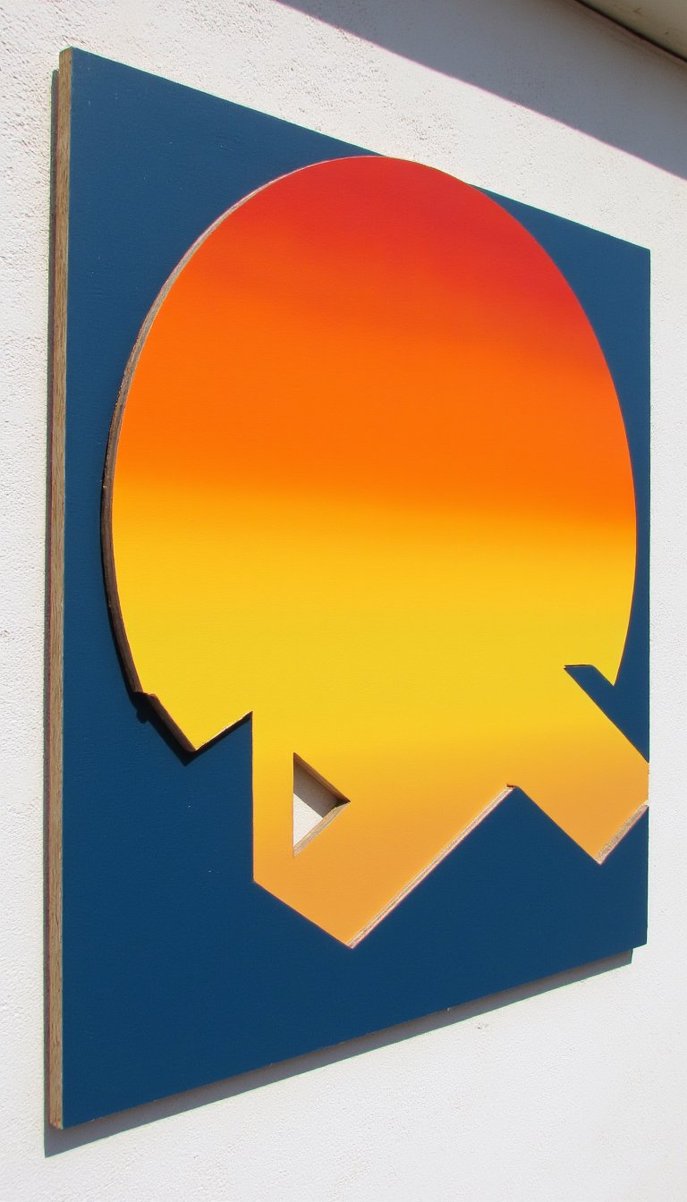 14. Geometric "Sun" Cut-Out Wall Art